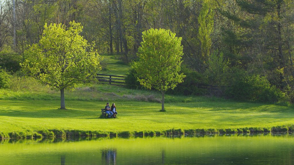 couple sitting on bench at ashland ohio county parks outdoor activities