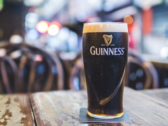 a pint of guinness at a bar in ashland nightlife