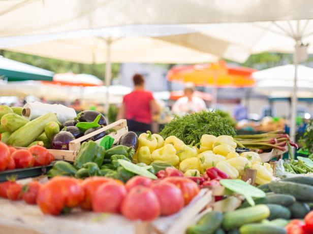 produce in cartons at a farmers market