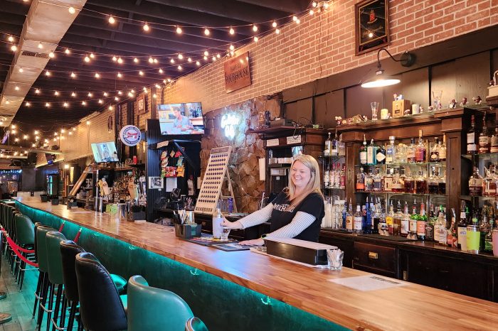 Kash Co. PourHouse bartender pouring a drink