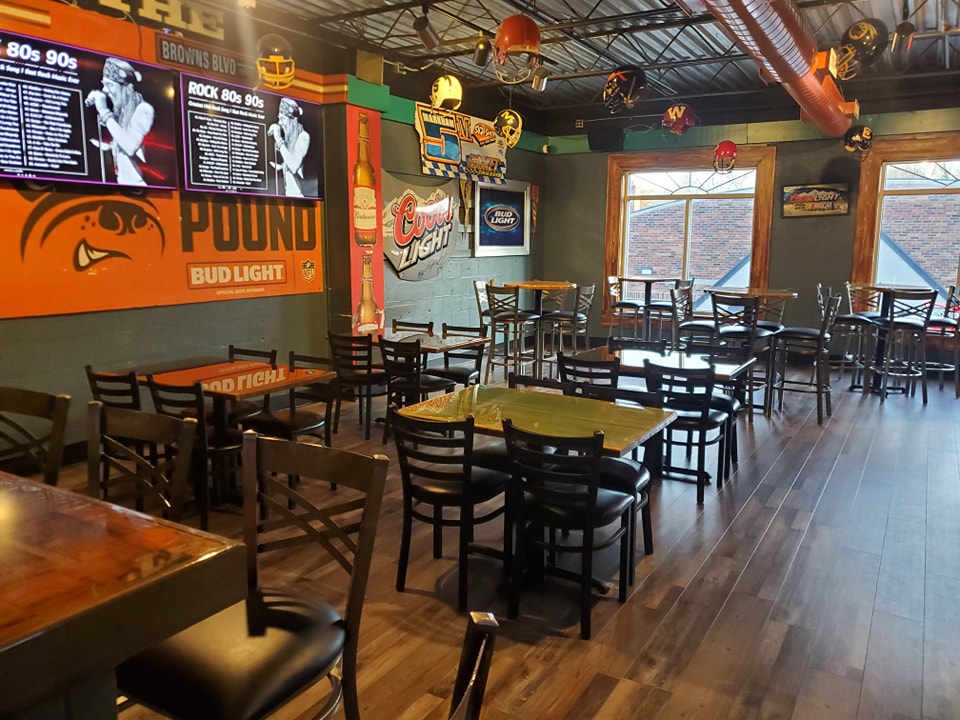 tables and chairs in new area of linders bar and grill in ashland ohio