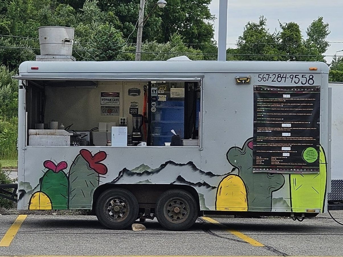 updated photo of chip off the ol guac trailor. Cacti painted on the side