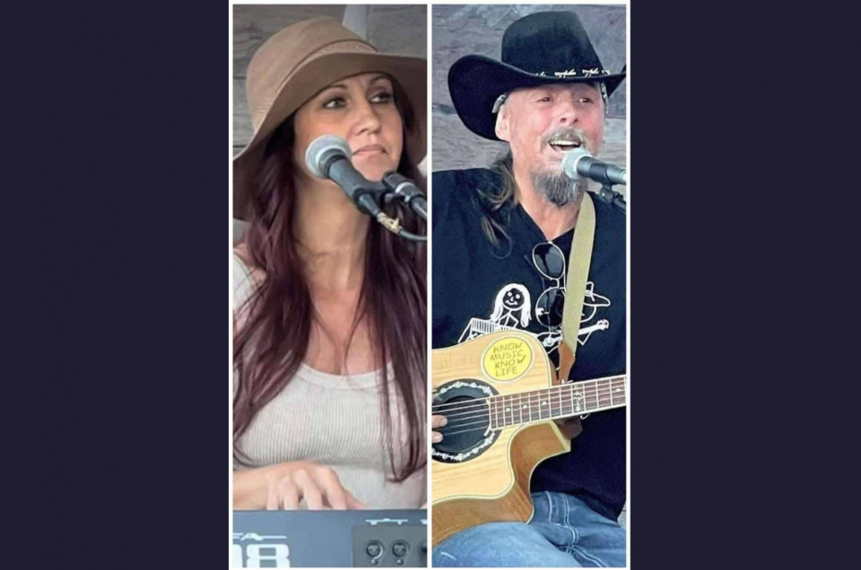 Kim and Dougie singing and playing keyboard and guitar
