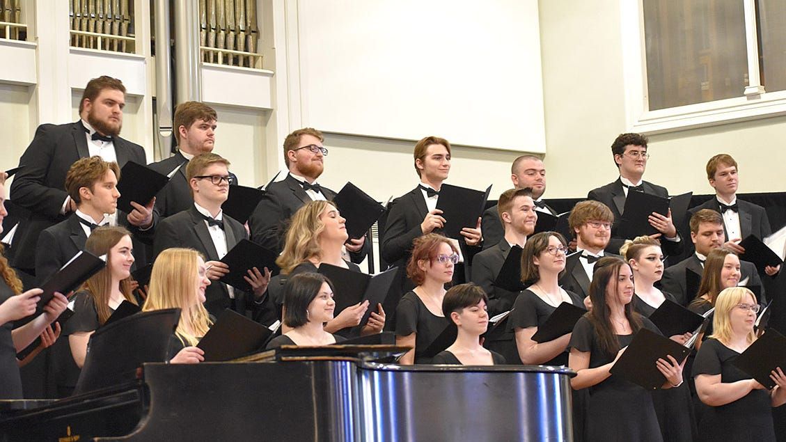 Members of the Ashland University Choir and the Ashland Area Chorus performing