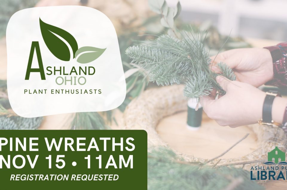 View of a person's hands working on assembling and pine bough wreath