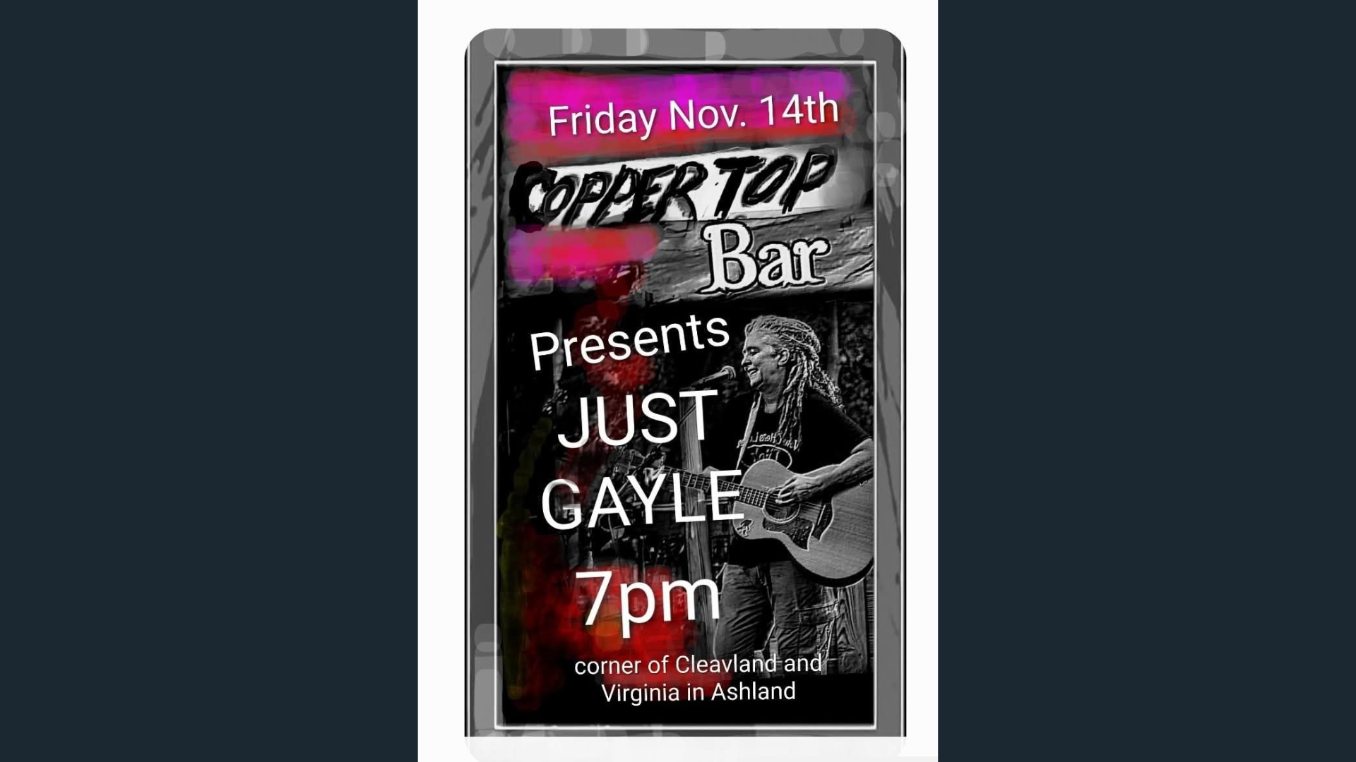 Gypsy Gayle singing and playing guitar