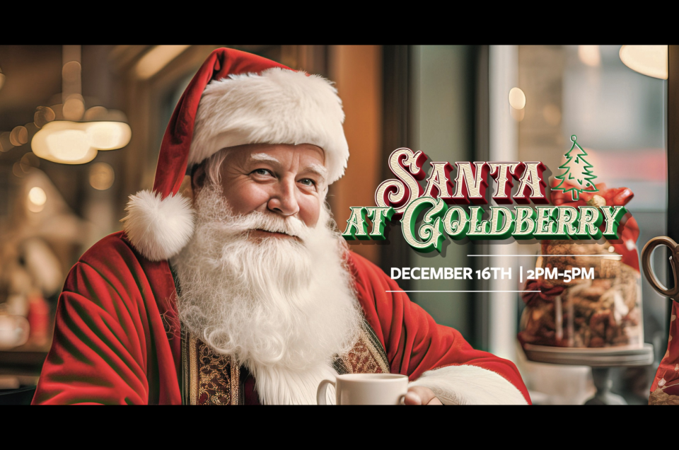 A friendly looking Santa holding a mug