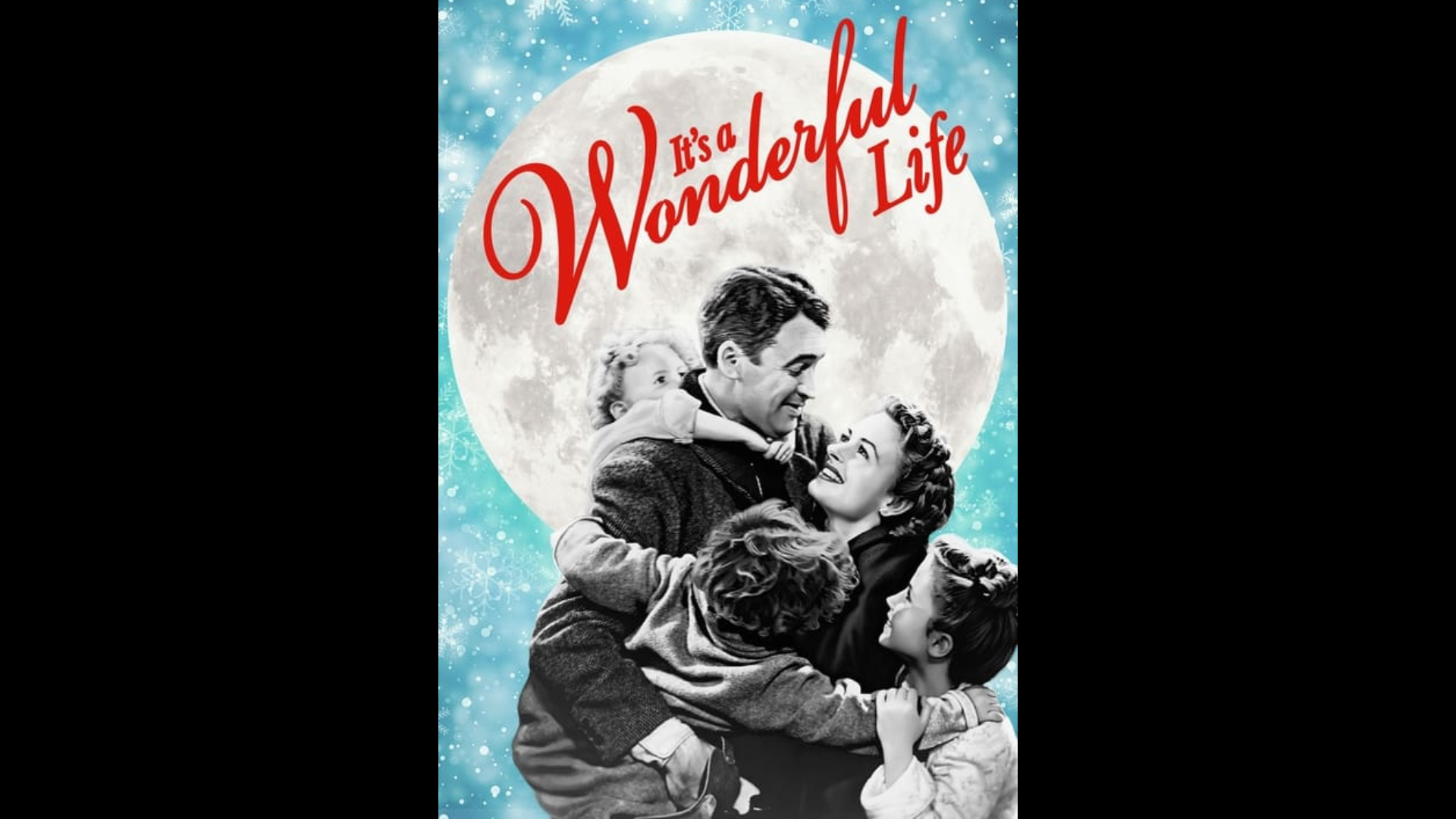 George Baily smiling at his wife while she is smiling looking up at him. He is hugging her and their three children who are gathered around him