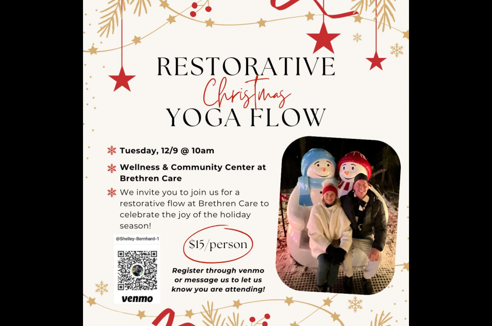 Yoga instructors smiling and sitting on a snowman bench at Candy Cane Trail